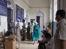 COVID-19 patients in line at a hospital in Mysore, India. Photo credit: Priya Darshan.