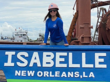 Isabelle Smith standing aboard the Isabelle