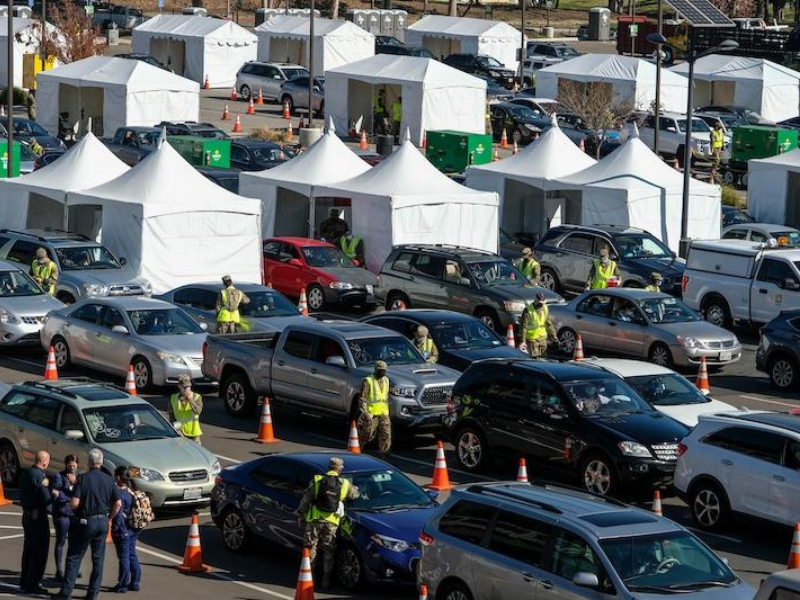 First responders navigating long lines of cars