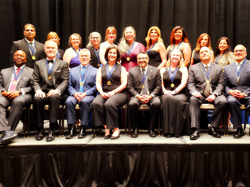 Susan Cheng poses for a group shot with other honorees