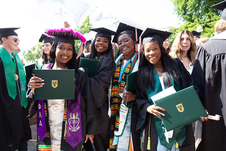 a group of public health undergrads with their diplomas