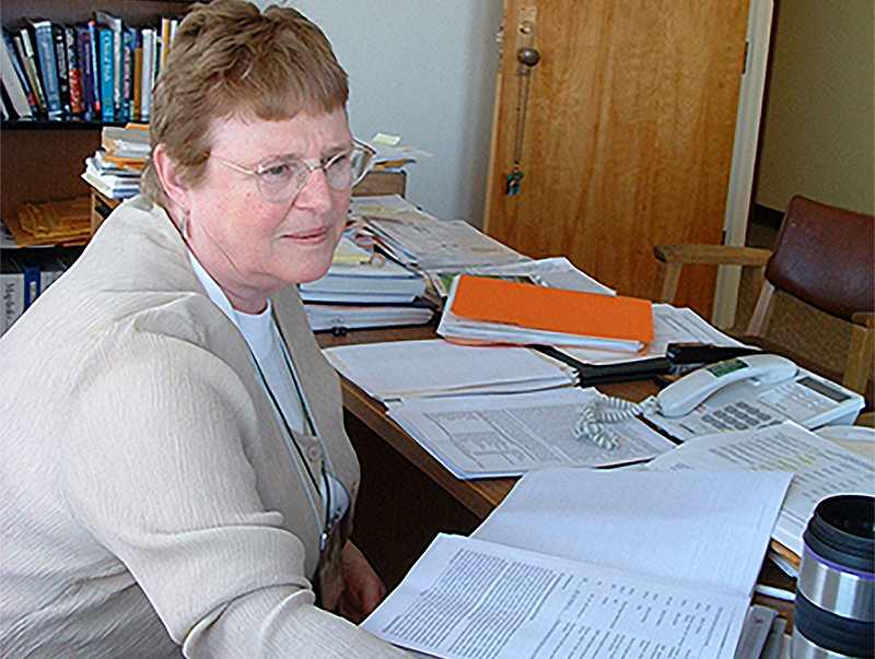 Emerita Professor Fran Mather at her desk