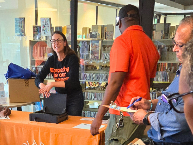 Photo of individuals learning gun safety practices
