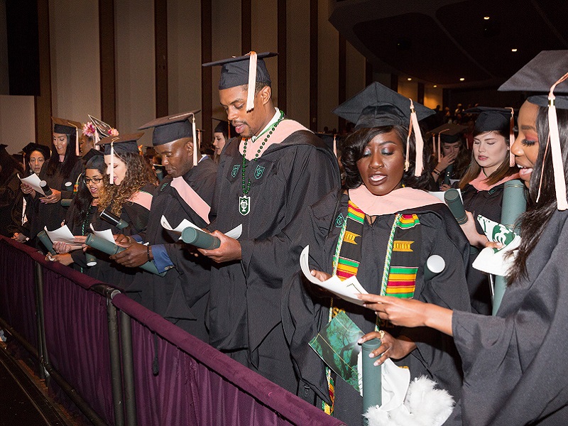 Graduates read oath 