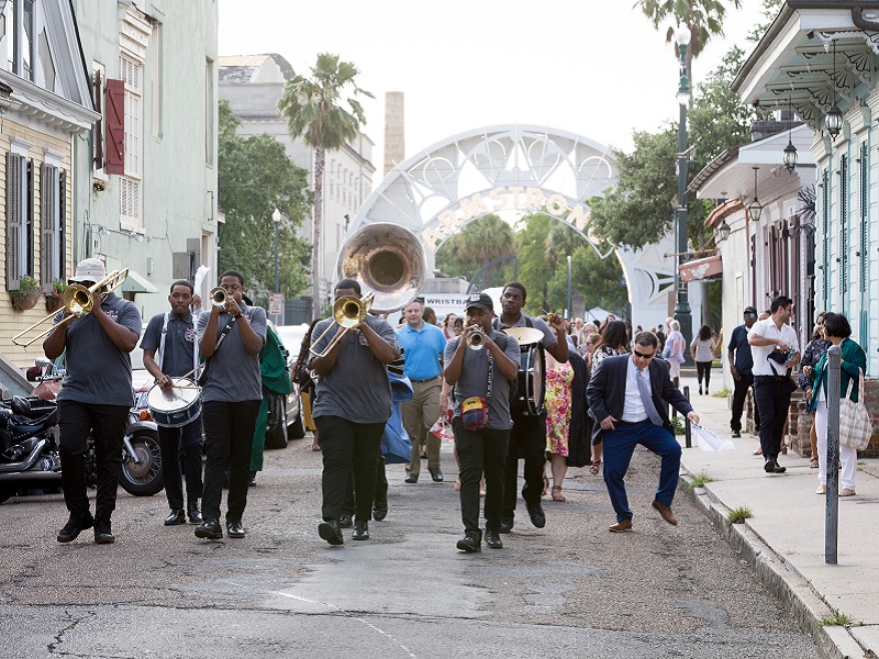 second line moves into the French Quarter