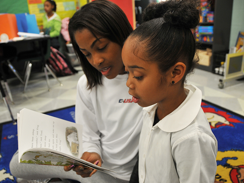 BSPH student reading to a child.