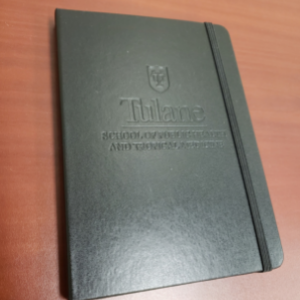 Image of a black Tulane SPHTM notebook