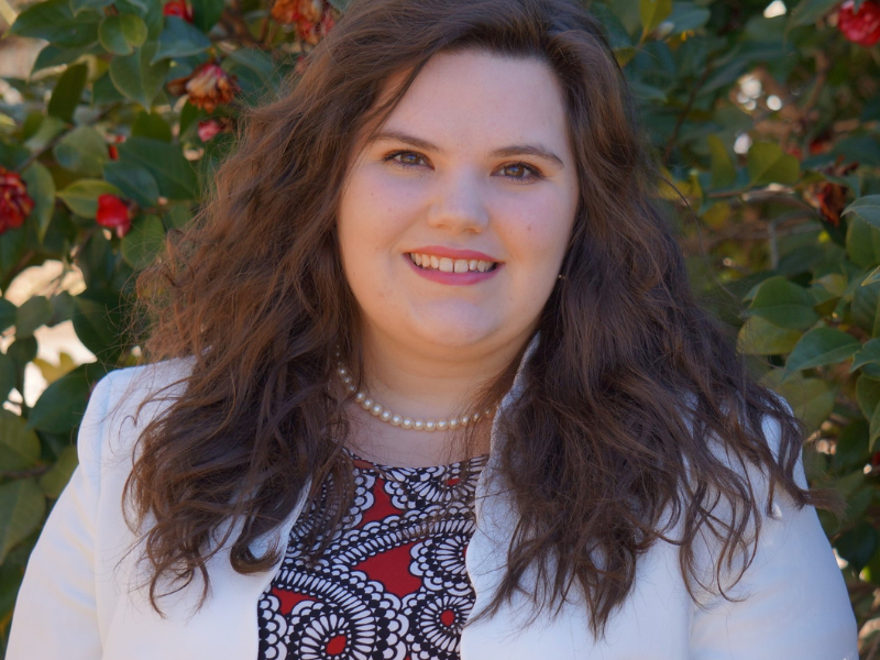 Allie Cheek, smiling, headshot