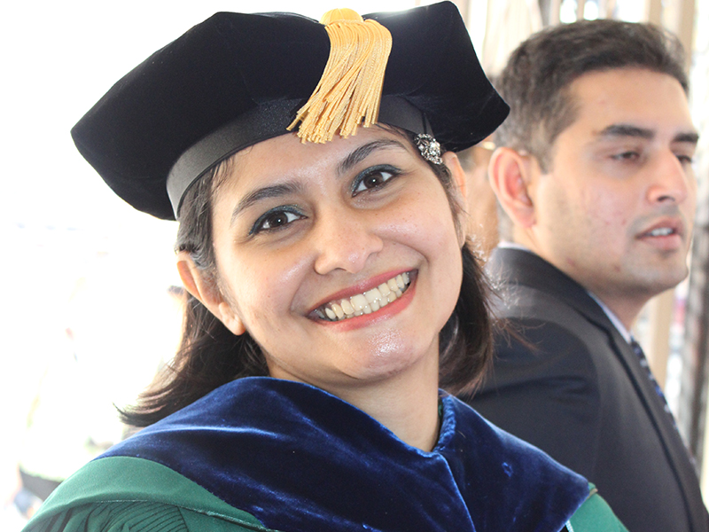 Female doctoral graduate in regalia