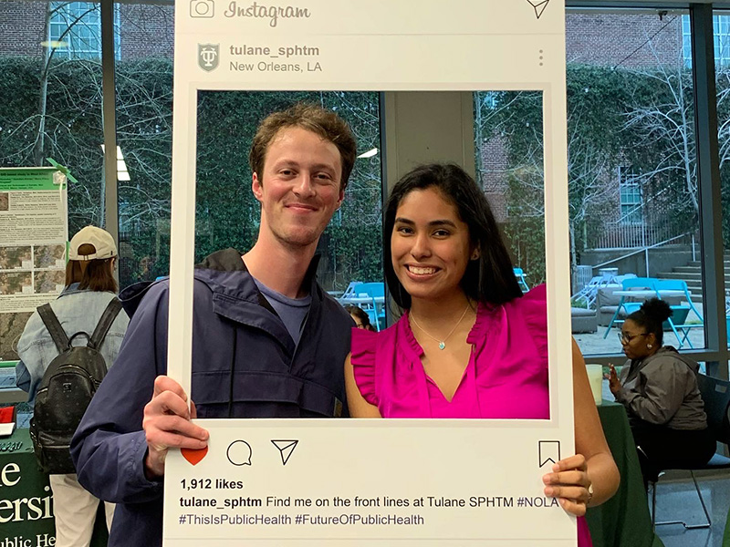 BSPH students Ingebor Hyde and Benjamin Smallson Jackson posing with Instagram frame 