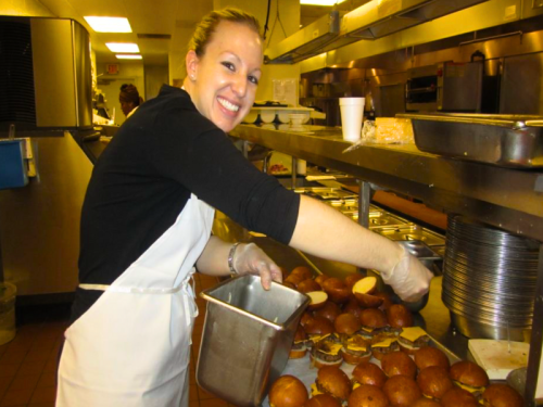 A dietitian student preparing food