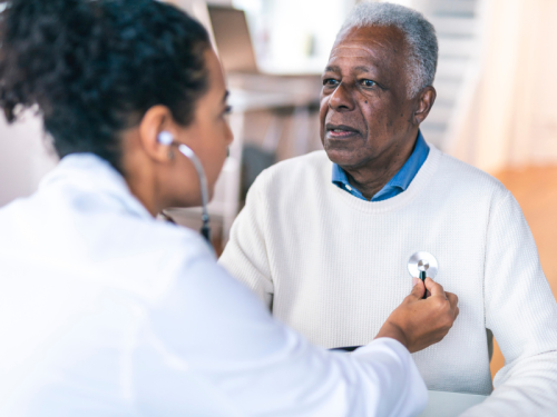 A patient is checked by a doctor
