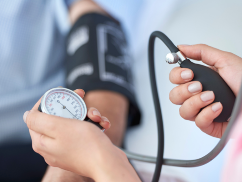Blood pressure being checked