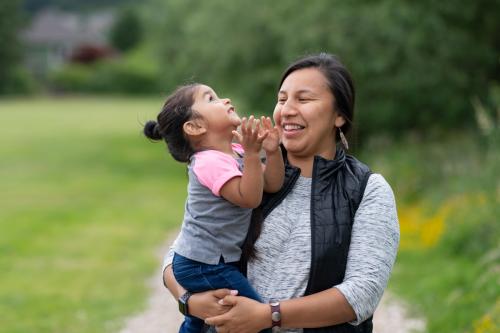 Mom with kid in an outdoor environment