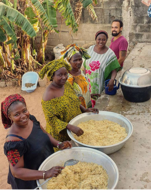 Global Scholars Program | Celia Scott Weatherhead School of Public Health and Tropical Medicine A group of women preparing food