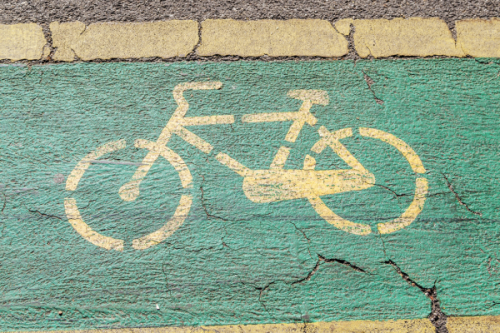 What is Public Health? | Celia Scott Weatherhead School of Public Health and Tropical Medicine bike icon painted in bicycle lane