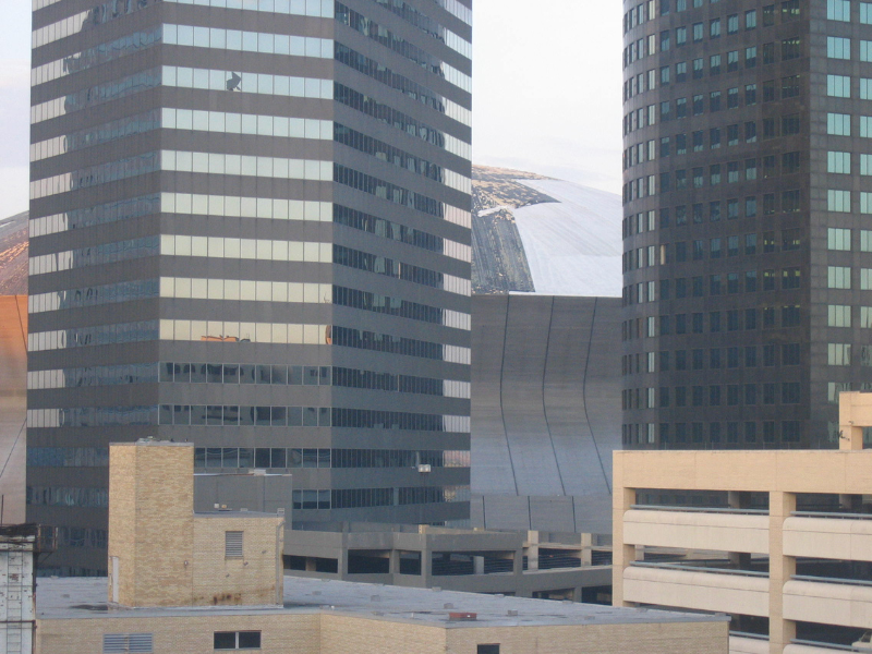 Superdome damage visible between buildings