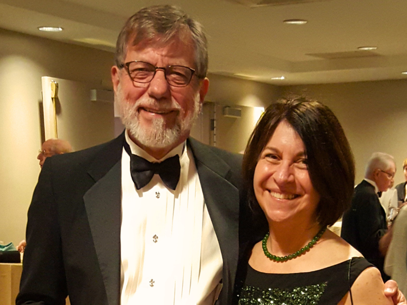 Hugh Long and Susan Krinsky smiling at a formal event.