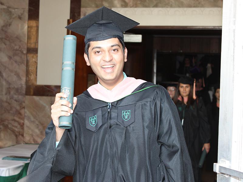 Alumnus Jaffer Shariff with MPH diploma on graduation day Alumnus Jaffer Shariff with MPH diploma on graduation day