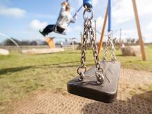 Child on swing. (Photo from Thinkstock)
