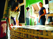 Photo of people managing donations at a food bank