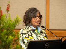 Melissa Gonzales speaking at the school's Climate Symposium