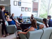 People enjoying the lounge area in the new shared space in Caroline RIchardson Hall, Tulane Uptown Campus