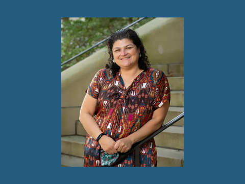 Eva Silvestre, PhD Associate ProfessorProgram Director, International Health and Development MPH ProgramData Strategist, Office of Equity, Diversity, and Inclusion Eva Silvestre, smiling, standing on some stairs, outside