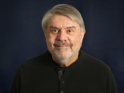 Photograph of Gene Beyt wearing a dark shirt.
